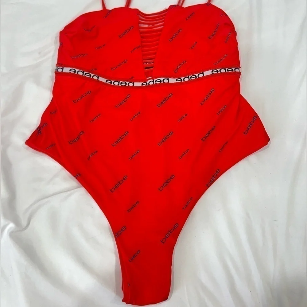 Bebe blood orange red swimsuit black band with logo size XL